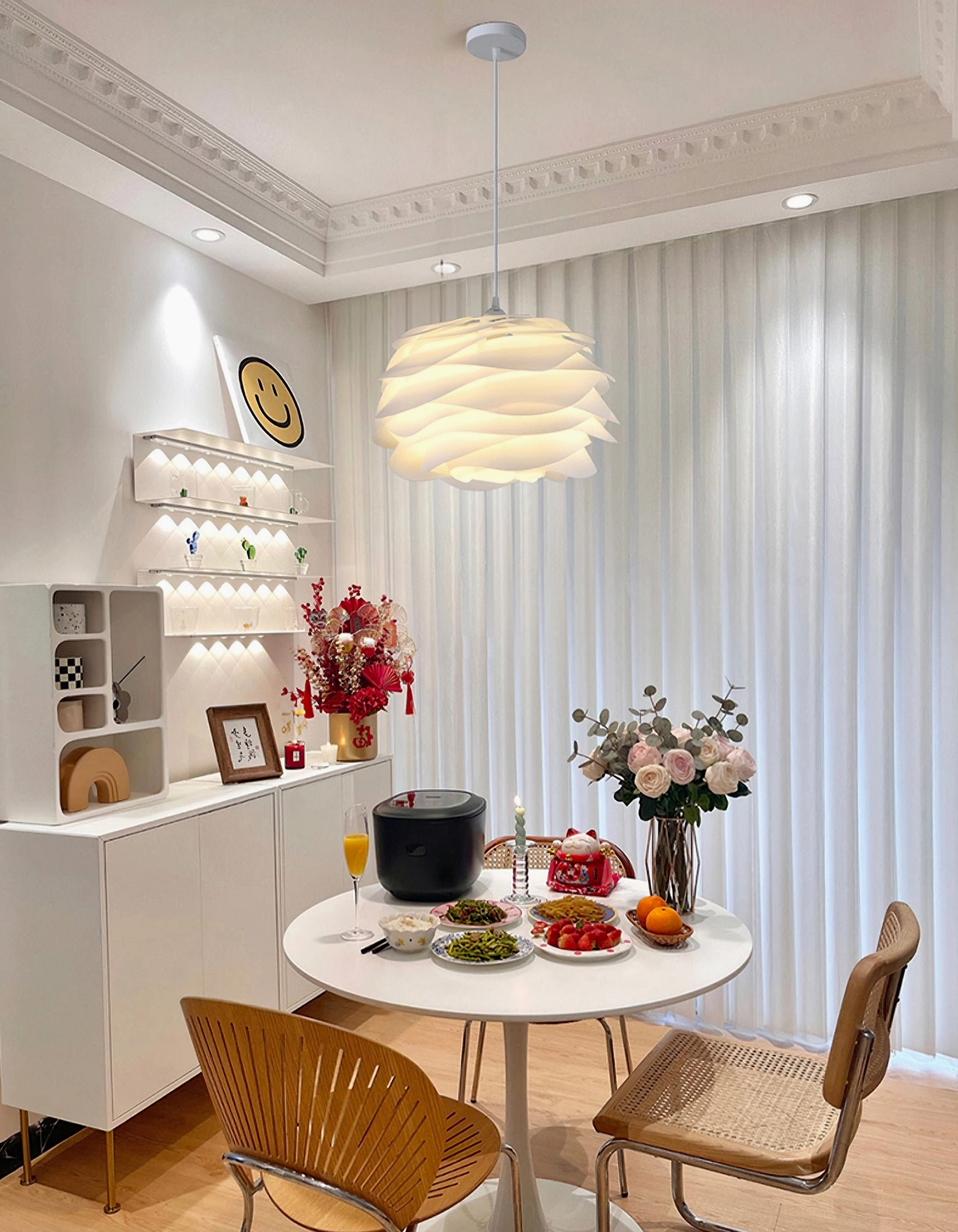 Carmina pendant light in modern dining room interior, ambient lighting over table setting