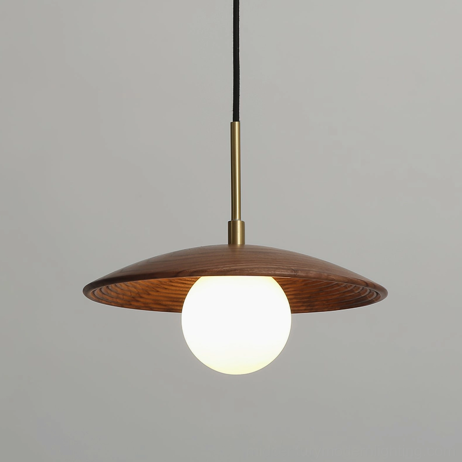 Caroll pendant light architectural detail shot emphasizing craftsmanship of wood and metal construction