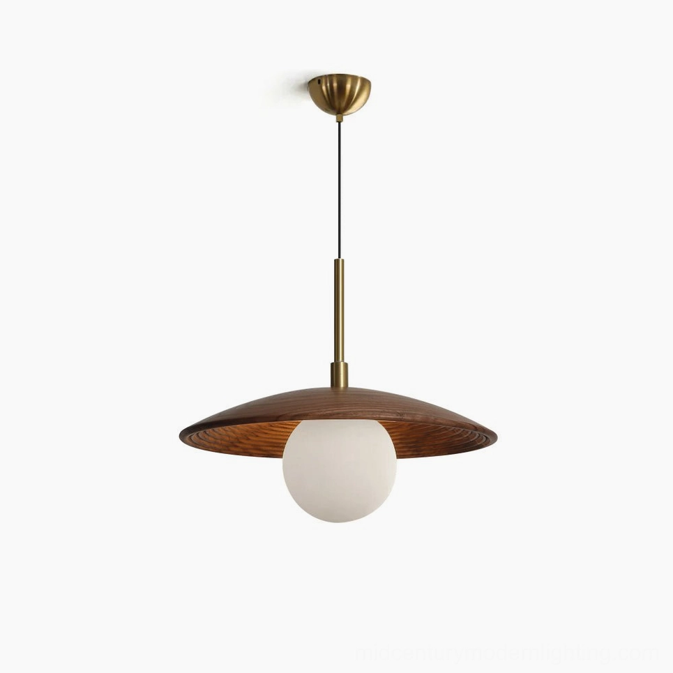 Caroll walnut and brass mid-century modern saucer pendant light with frosted white glass globe, front studio view