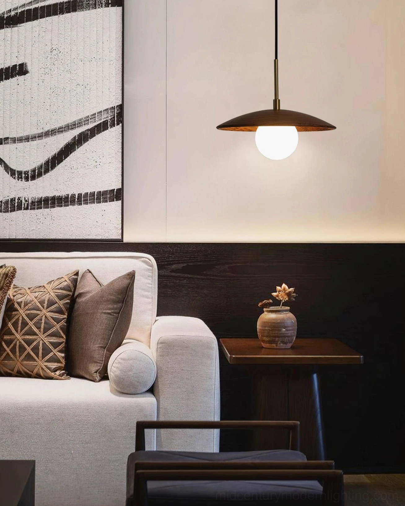 Single Caroll pendant light in contemporary chinese living room with neutral tones, sofa and wall art