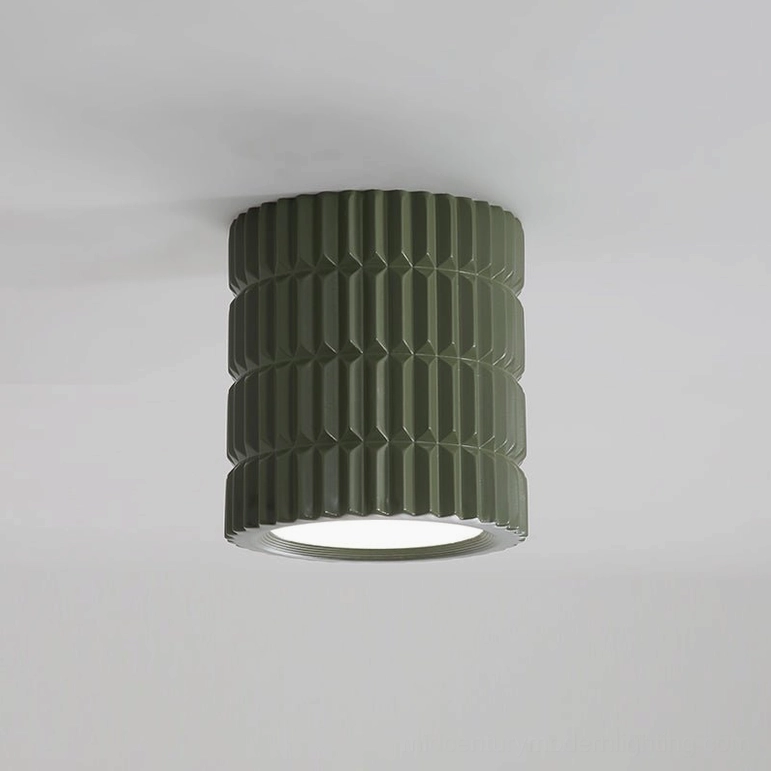 Carran ceiling lamp studio product photography, front centered view of ribbed cylindrical form