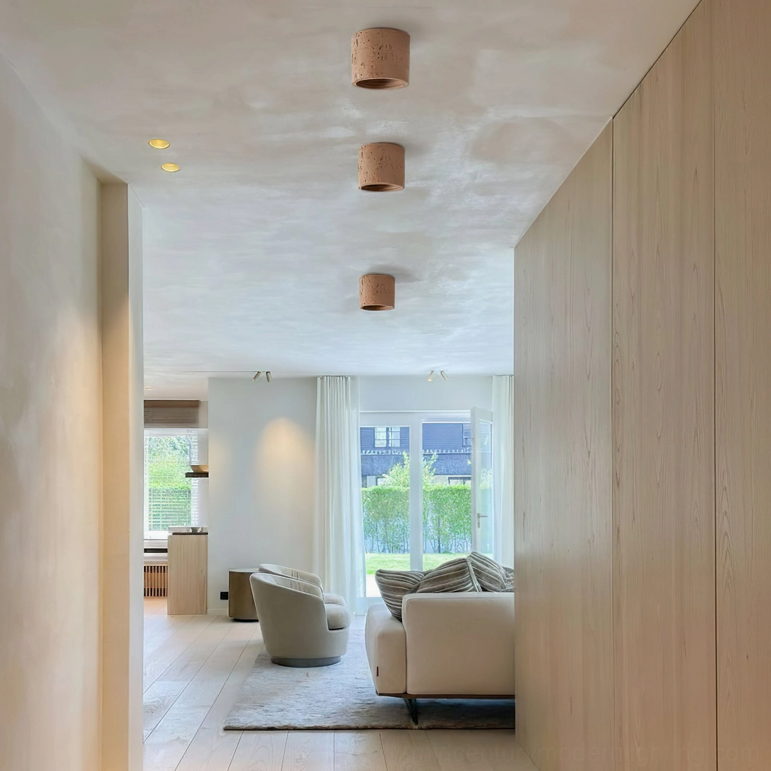 Carso handcrafted ceiling lamp with cork-like texture, open-plan living space
