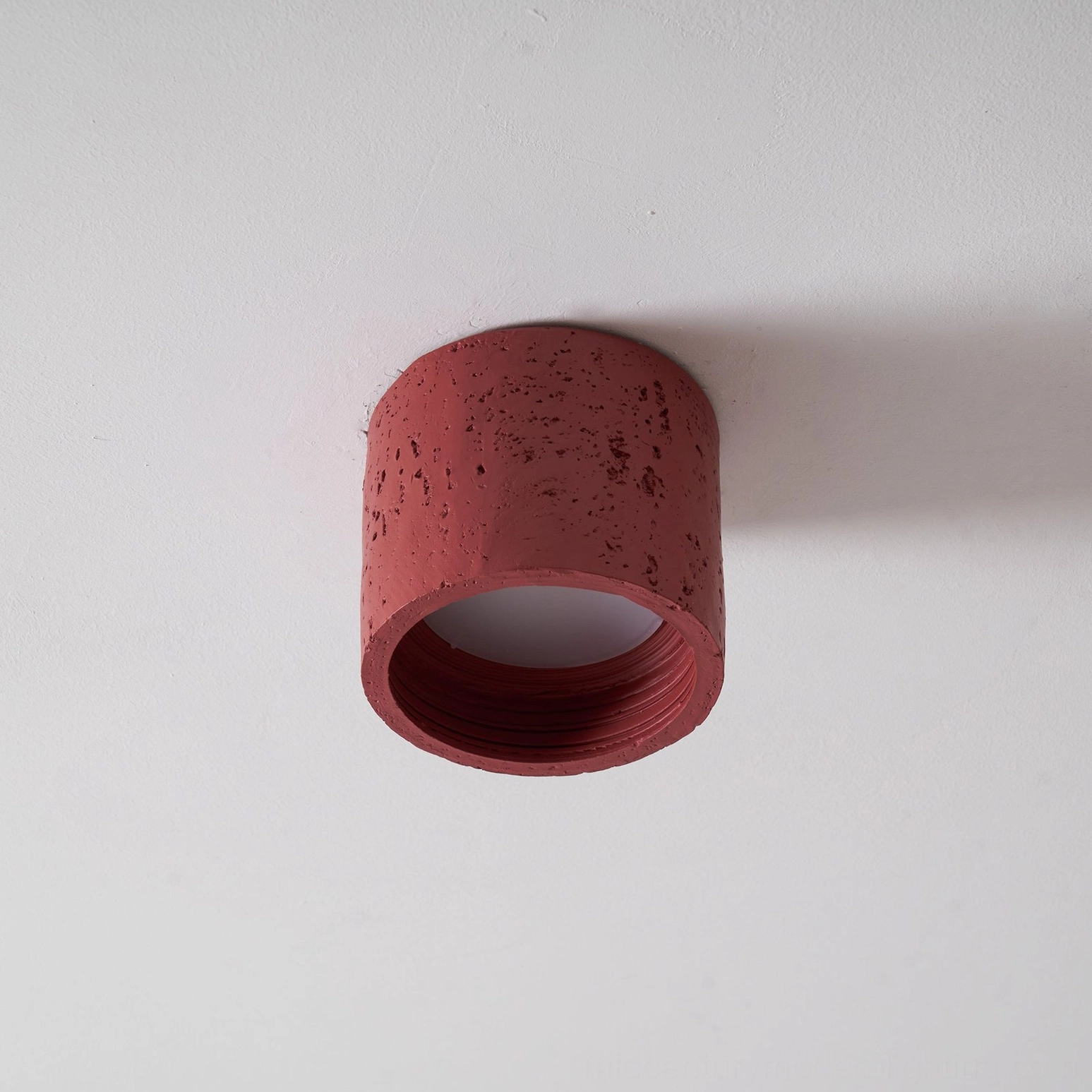 Carso pendant lamp illuminated, warm-white LED glow through composite material