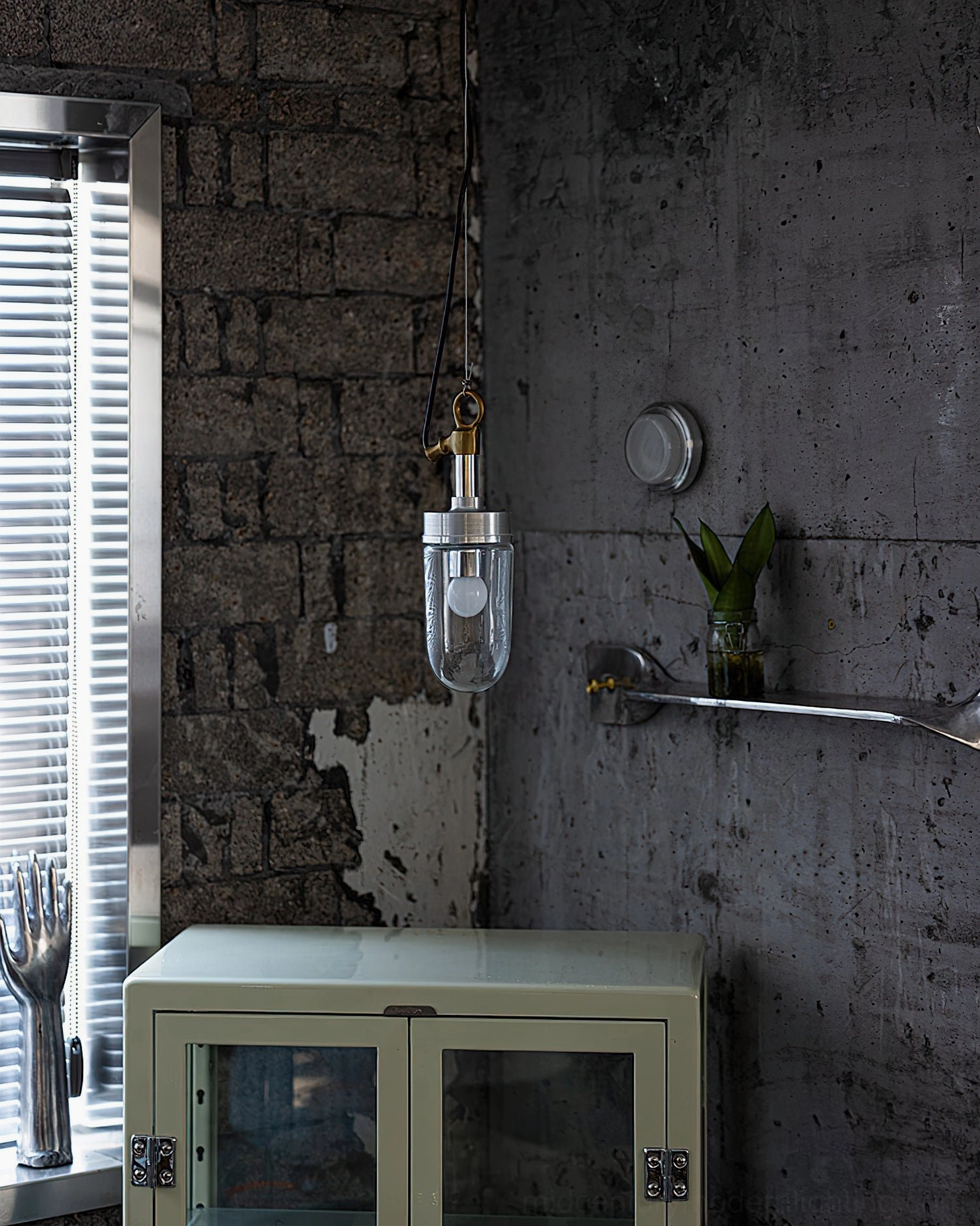 Carson Capsule Pendant Light cohesive industrial brick wall living space contemporary design