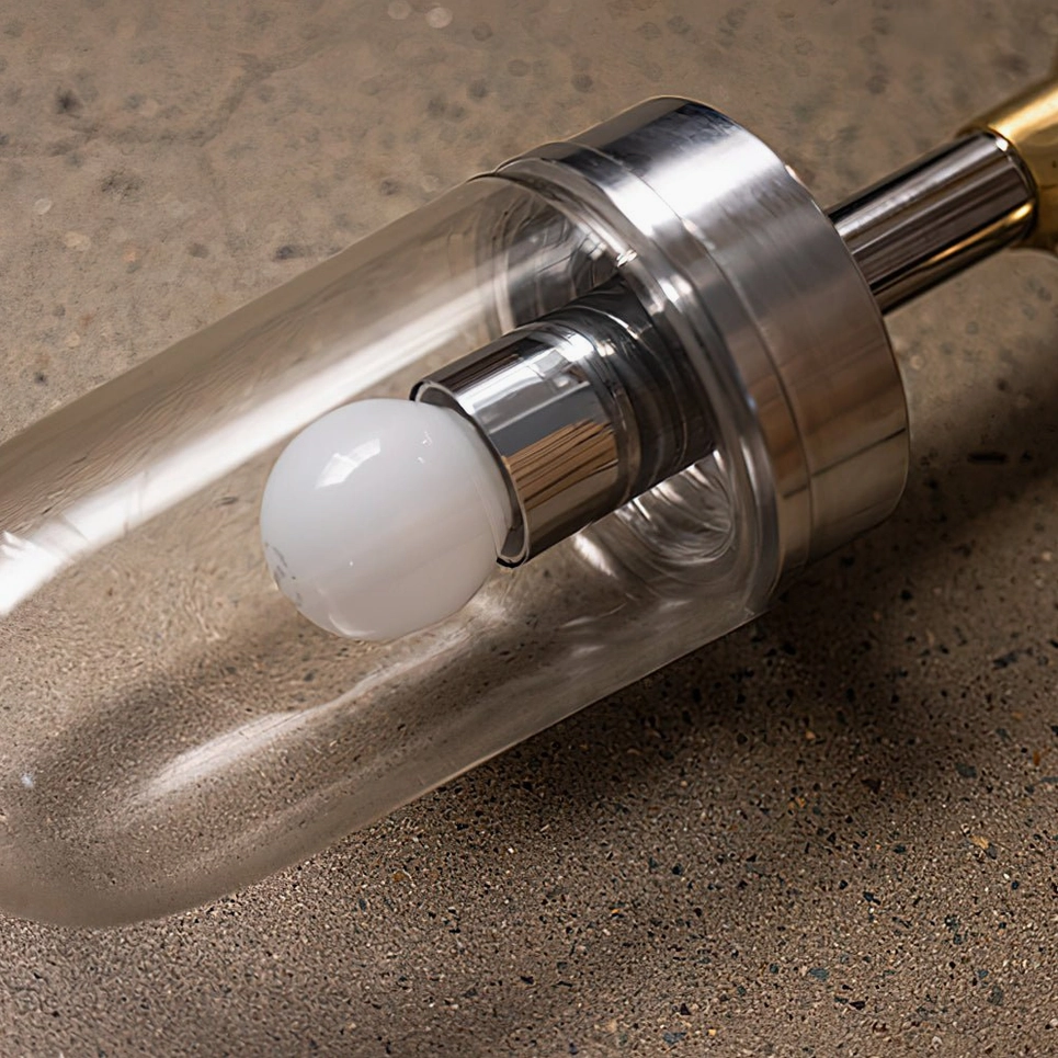 Carson Capsule Pendant Light macro close-up assembly showing exposed bulb silver base clear glass