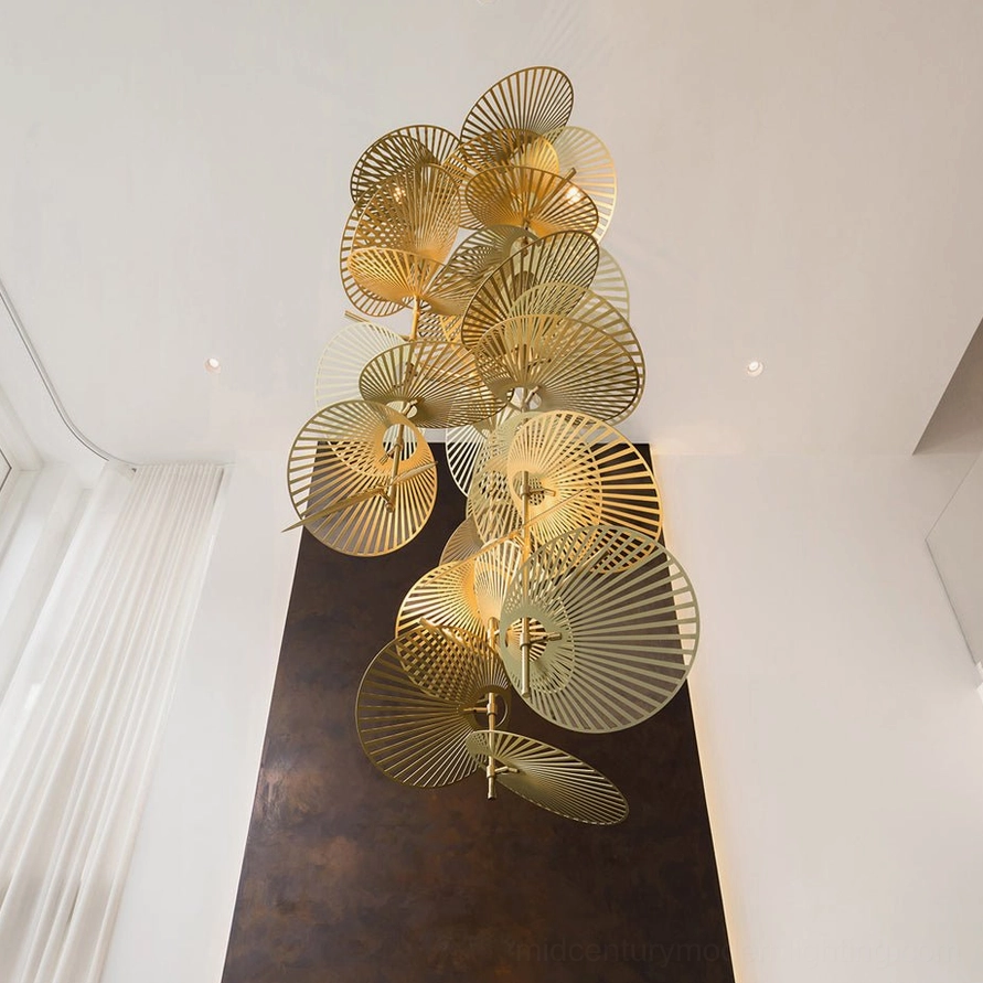 Cascade fan chandelier close detail of overlapping fan elements in warm brushed gold finish