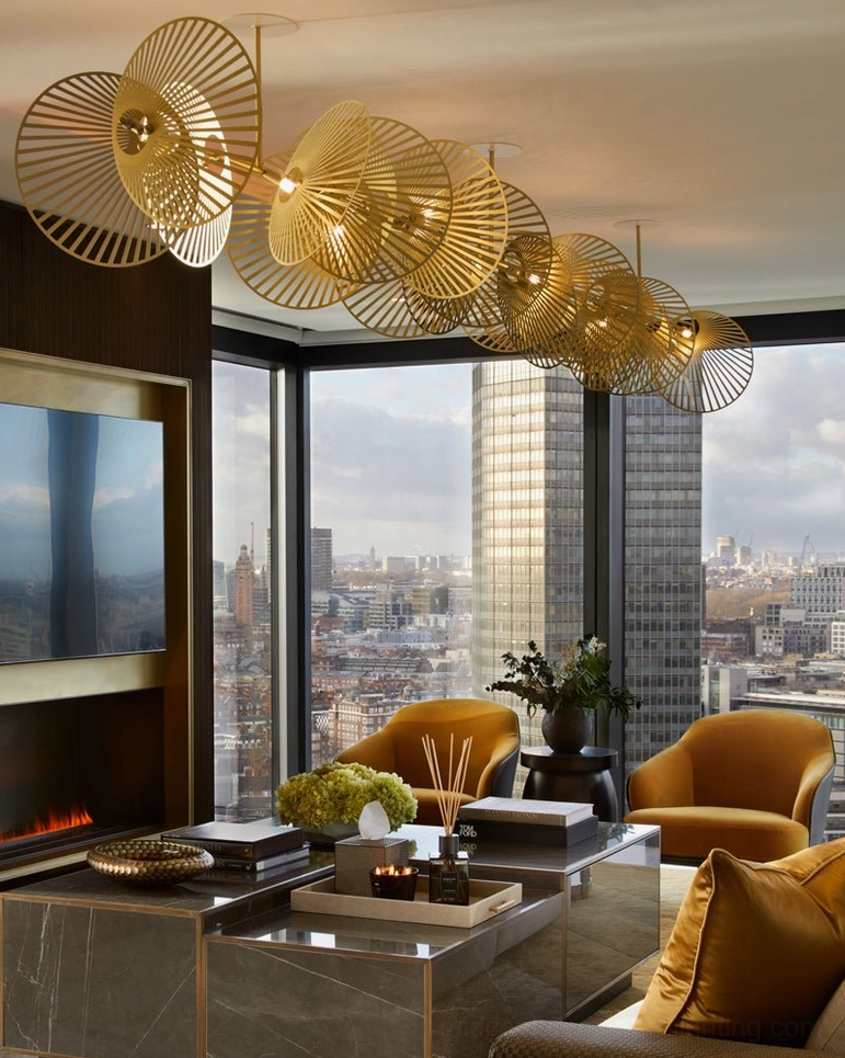 Wide ceiling cascade fan chandelier at eye-level in penthouse living room modern luxury design