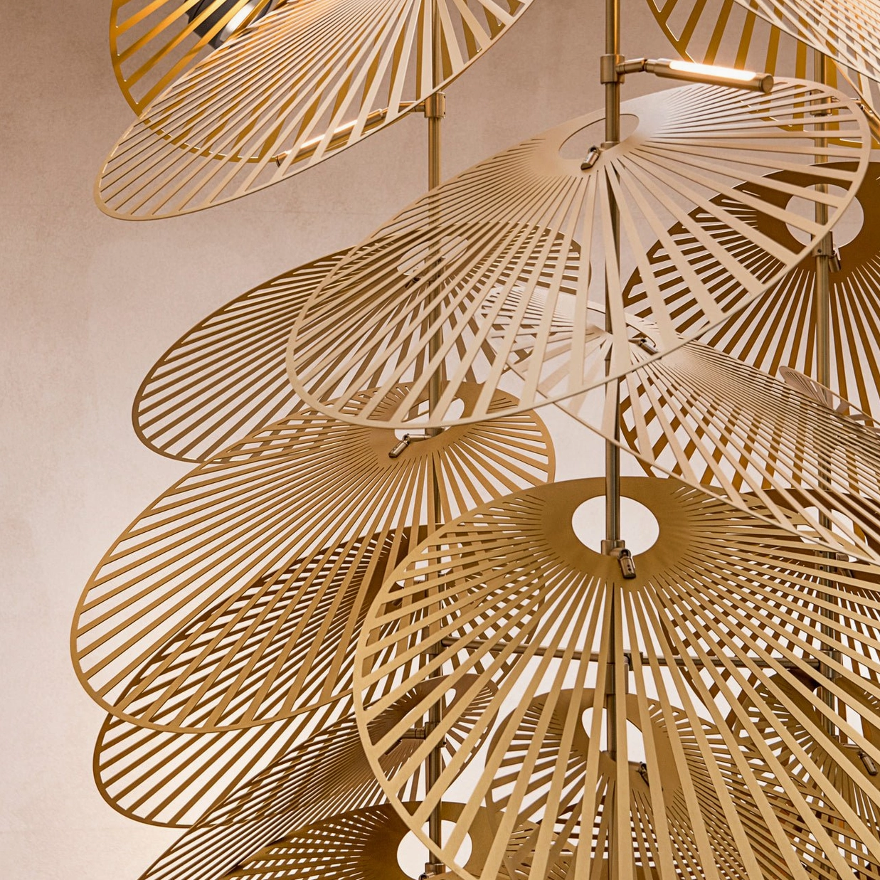 Cascade fan chandelier artistic view emphasizing movement and sculptural quality of fan discs