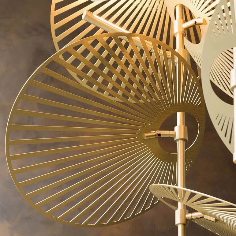 Cascade fan chandelier from below showcasing layered fan discs in gold brushed metal finish