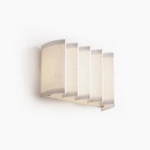 Cascade linen wall sconce with stepped ribbed fabric shade, front view on white background