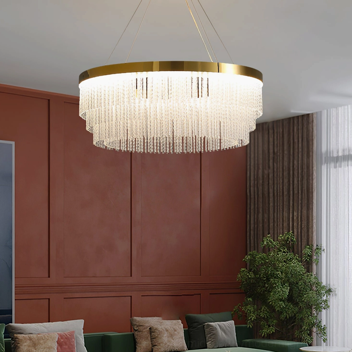 Tiered crystal chandelier with cascading glass element detail and warm illuminated glow