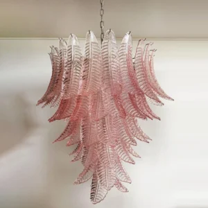 Cascading pink glass leaves Murano chandelier overhead angle with neutral indoor background