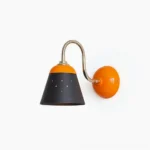 Casper retro funnel wall sconce front view, color-blocked red and black aluminum shade, modernist design
