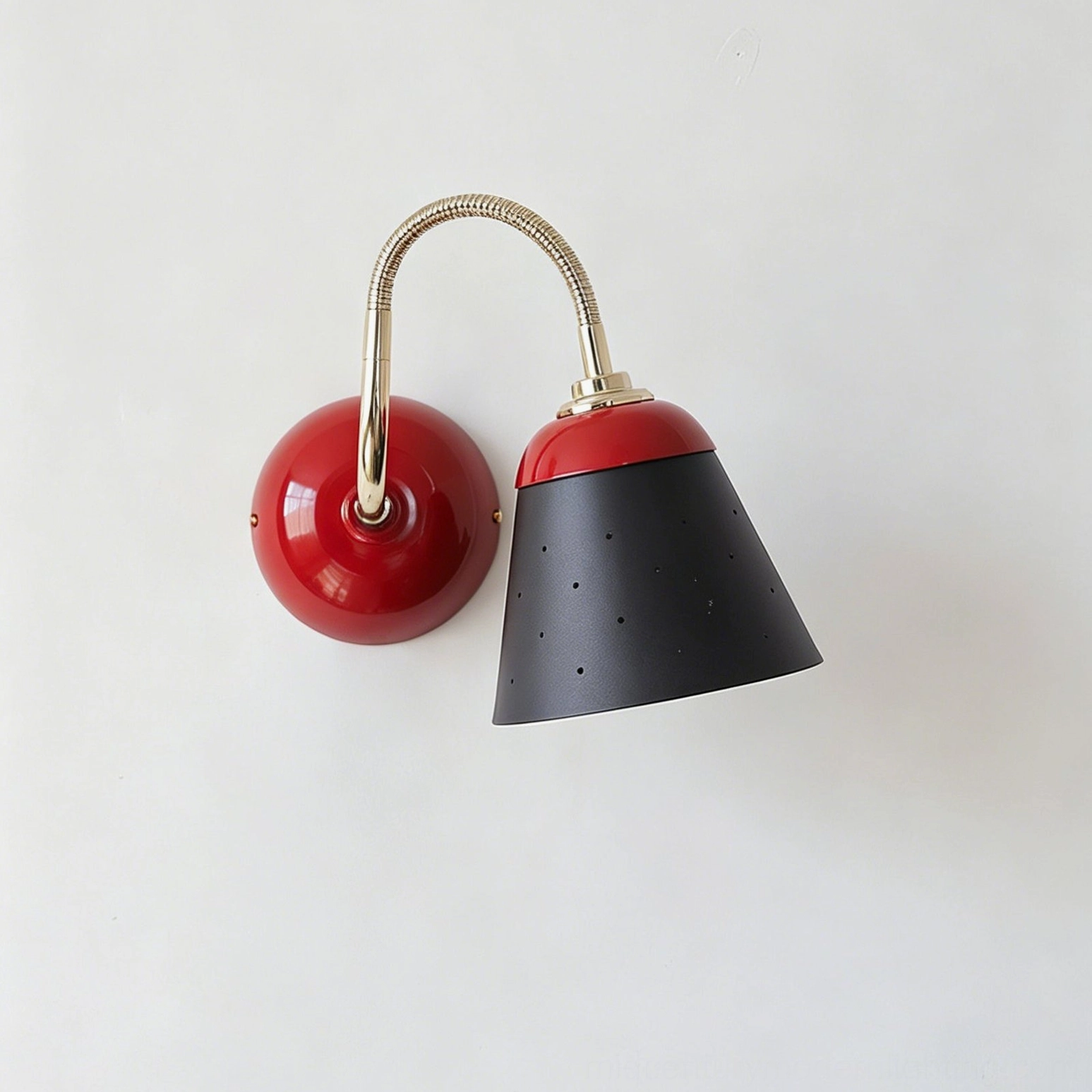 Casper funnel sconce side profile, red and black color-blocked design, perforated metal shade detail