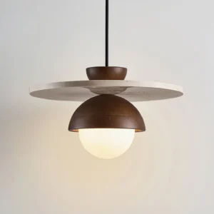 Cassini wooden pendant lamp showing layered construction with dark brown dome and frosted glass bulb detail