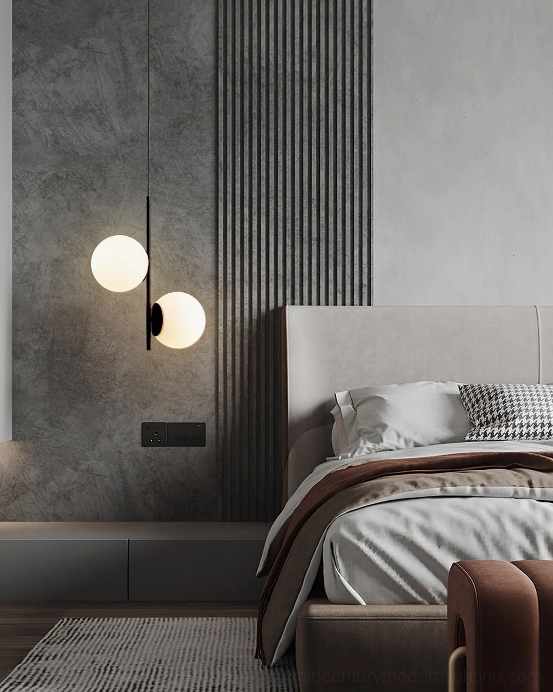 Contemporary Castell pendant fixture with frosted white glass shades and matte black metal elements in bedroom with textured feature wall