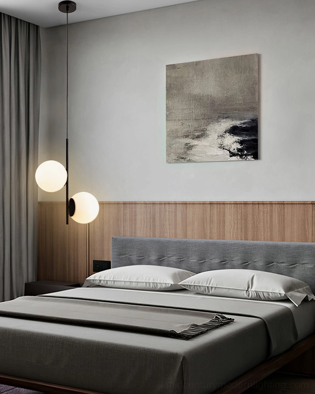 Castell mid-century modern double globe pendant with matte black suspension rod in minimalist bedroom with wooden accent wall