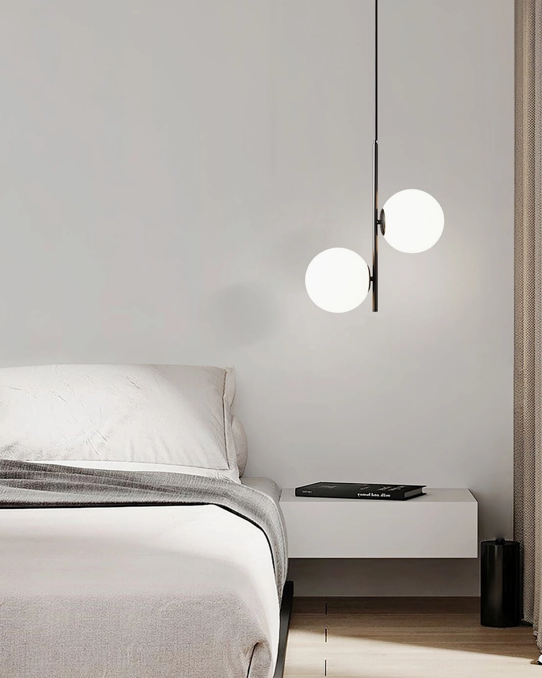 Close-up view of Castell pendant light canopy and suspension system with adjustable black cord mounting hardware