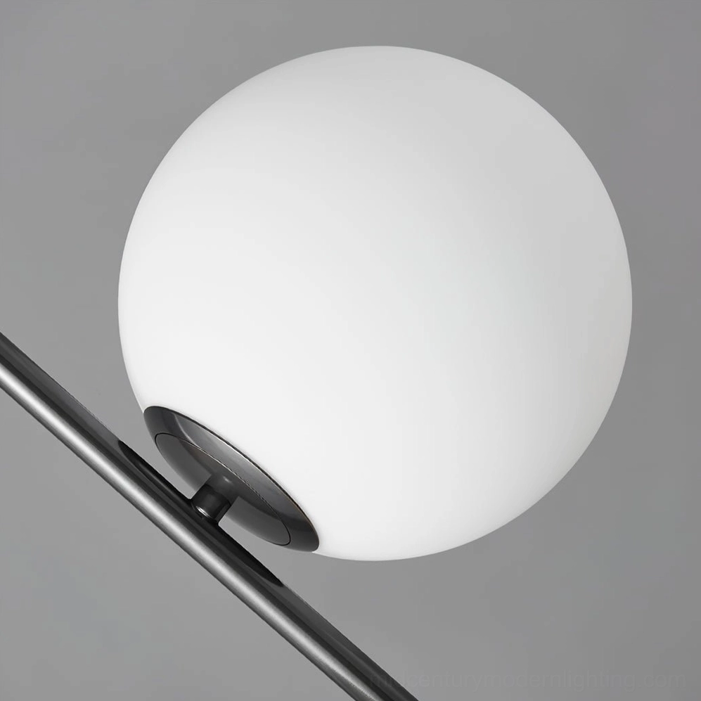 Overhead view of Castell mid-century modern pendant fixture showing dual frosted glass globe configuration and metal frame geometry