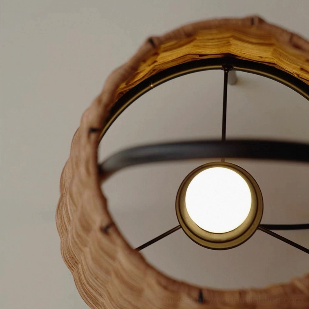 Catalina Coastal Table Lamp woven rattan body with black metal geometric base, minimalist sculptural lighting design