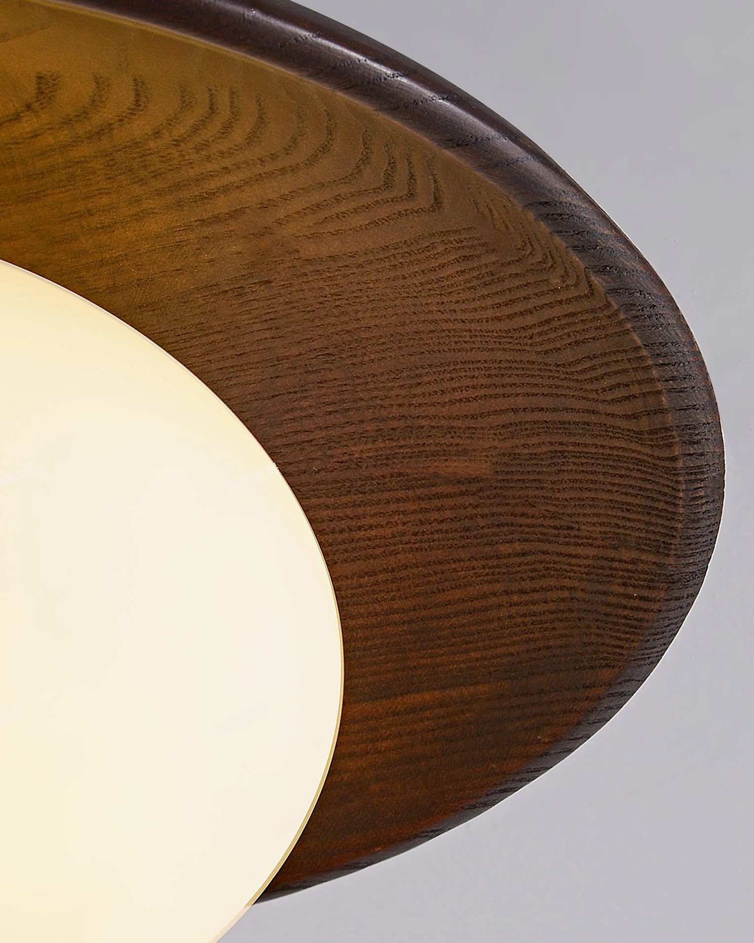 Cathy lamp texture detail showing frosted white glass shade and dark wood grain finish