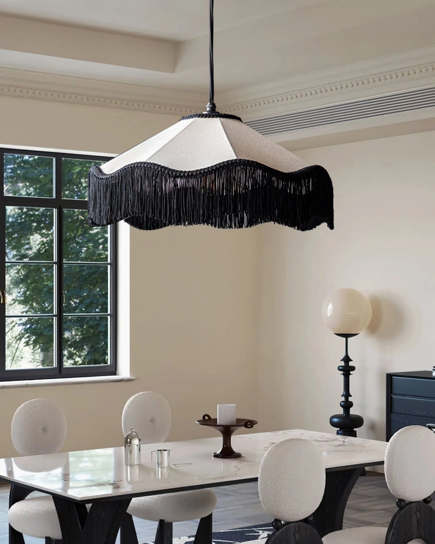 Cecile Tassel Pendant Lamp in modern bright dining room with glass dining table and tall floor lamp beside window