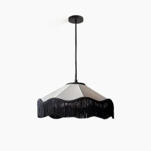 Cecile Tassel Pendant Lamp with cascading fabric fringe detail, front view on white background studio shot showing beige linen and black tassel trim