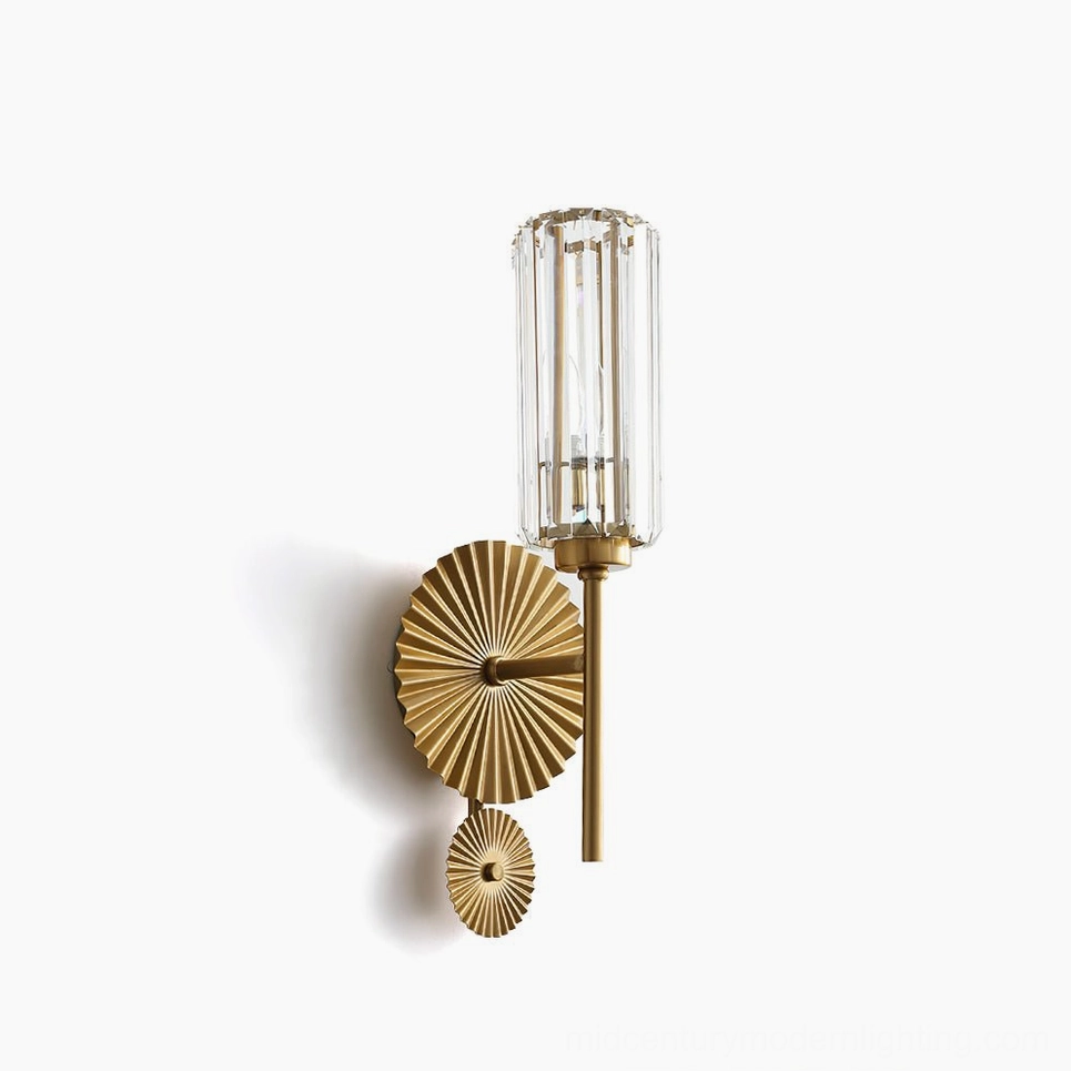 Cecily brass wall sconce with fluted clear crystal cylinder shade, studio frontal view showing geometric design details