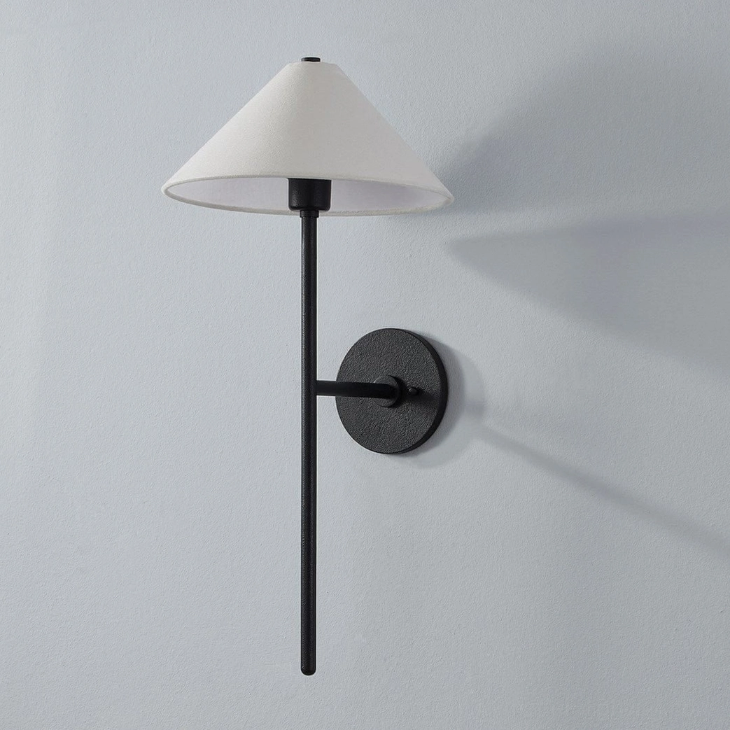 Cedar black wall sconce side view highlighting extended arm reach and fabric shade design with architectural precision