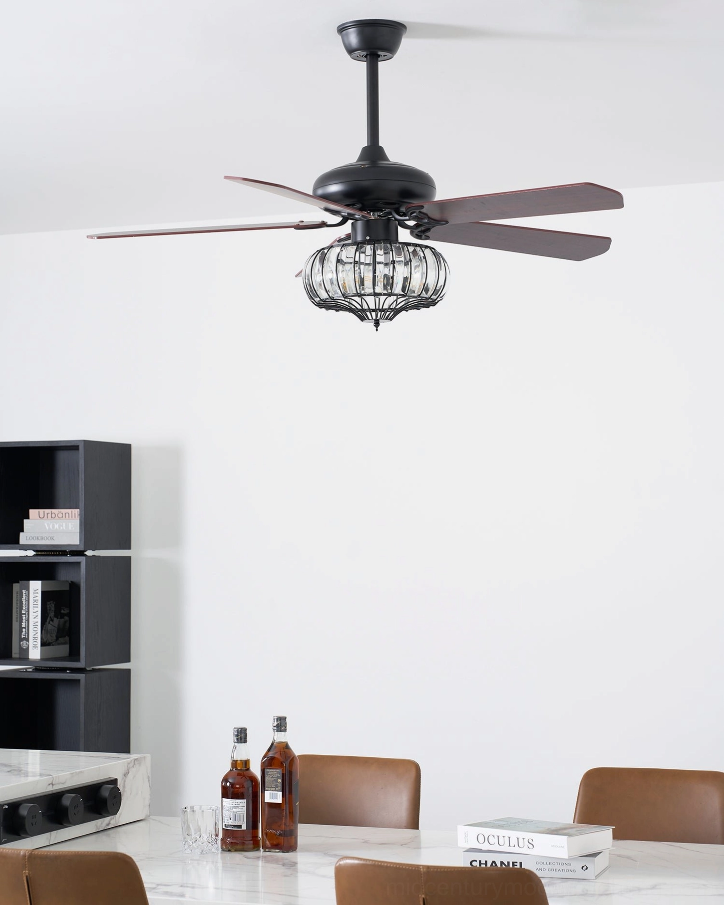 Ceiling fan light with crystal cage design, side angle showing 5 blade configuration and metal frame structure