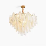 Celeste petal glass chandelier with gold hardware and white frosted glass petals on white background, front view