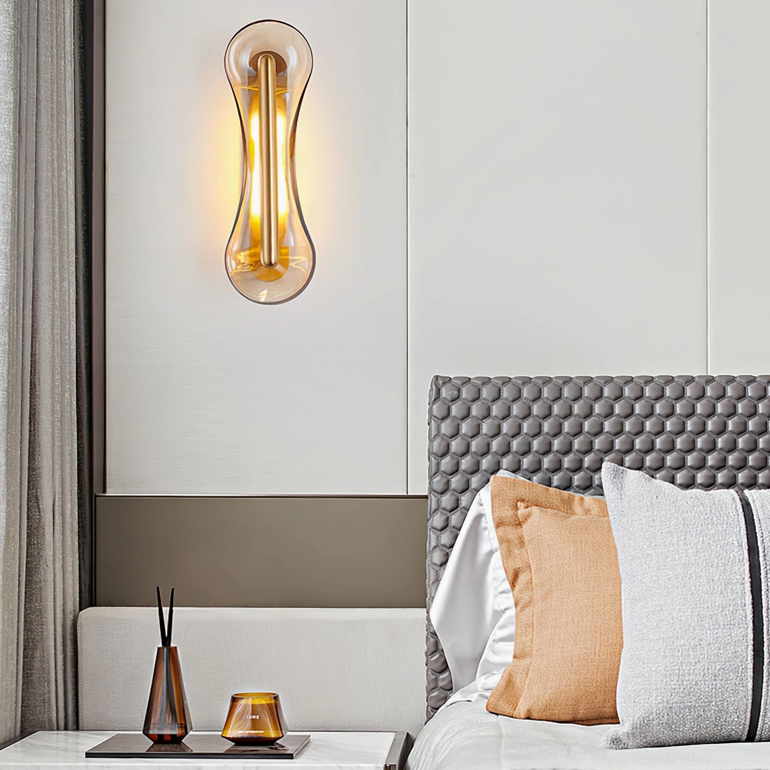 Luxury bathroom spa setting with Cell Wall Lamp warm illumination creating relaxation ambiance refined bathroom design