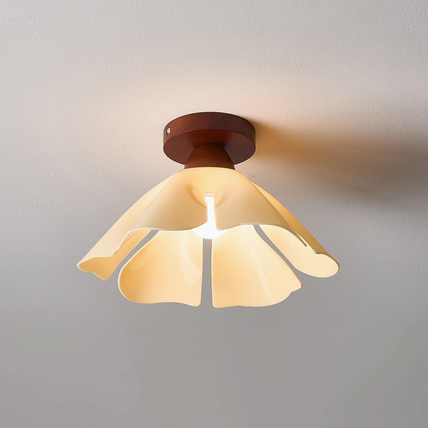 Cenia flush mount light demonstrating soft diffused illumination, warm glow distribution