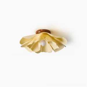 Cenia floral flush mount ceiling light with layered petal acrylic shade, warm cream finish shown in close-up overhead view