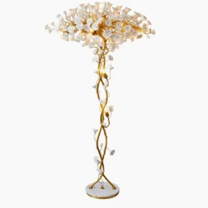 Ceramic flower floor lamp full frontal view with twisted brass pole and marble base on white background