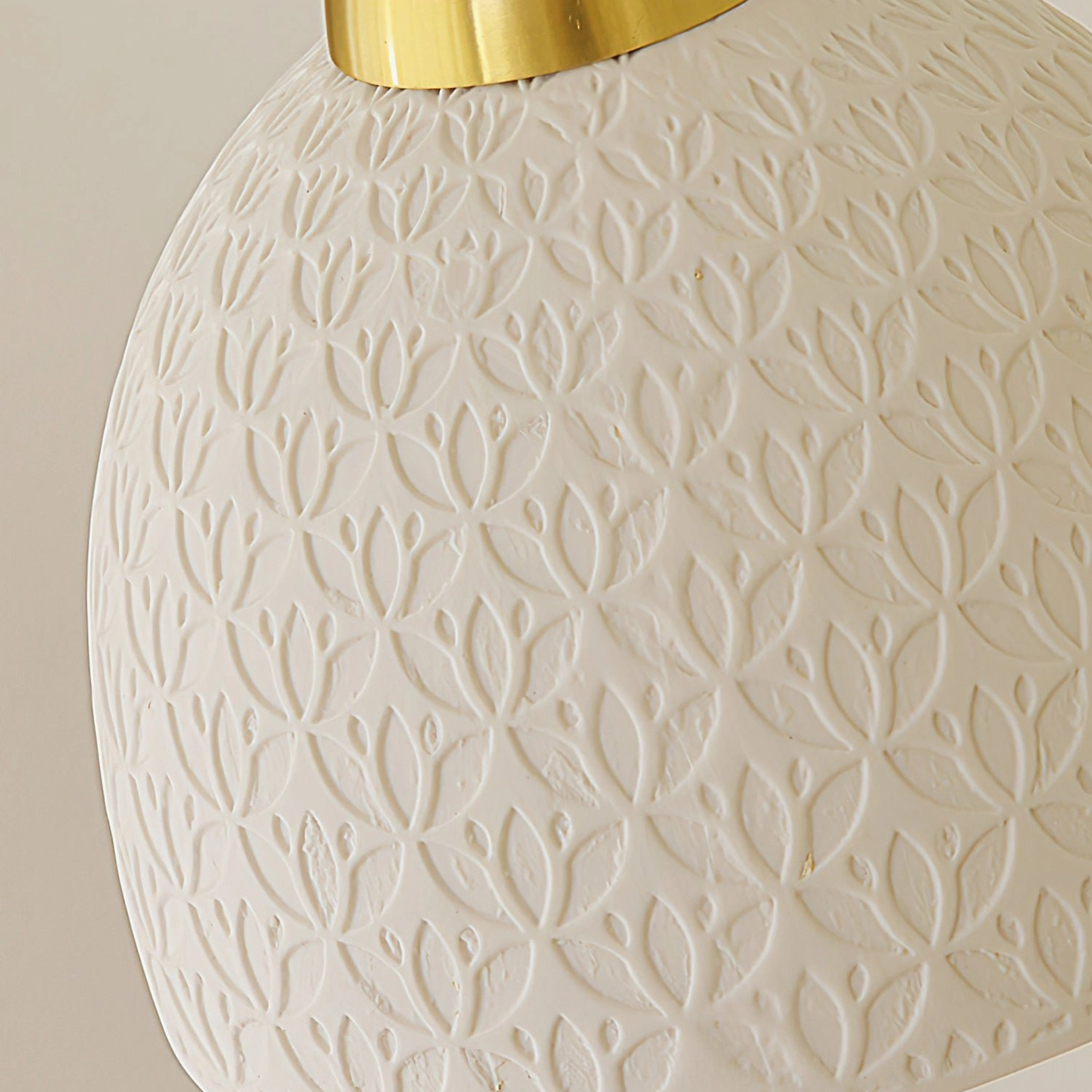 Handcrafted ceramic pendant collection showing four sculptural silhouette variations