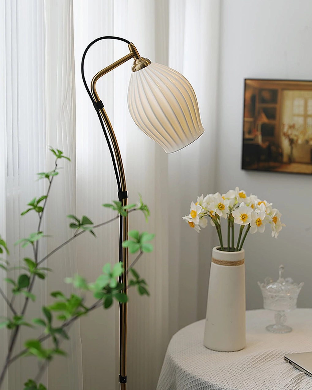 Ceramic ribbed arc floor lamp showcasing full sculptural form and modern minimalist design