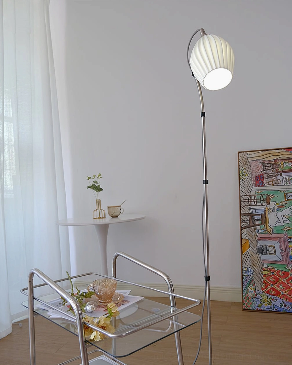 Ceramic ribbed floor lamp demonstrating warm light casting and ambient illumination in modern interior