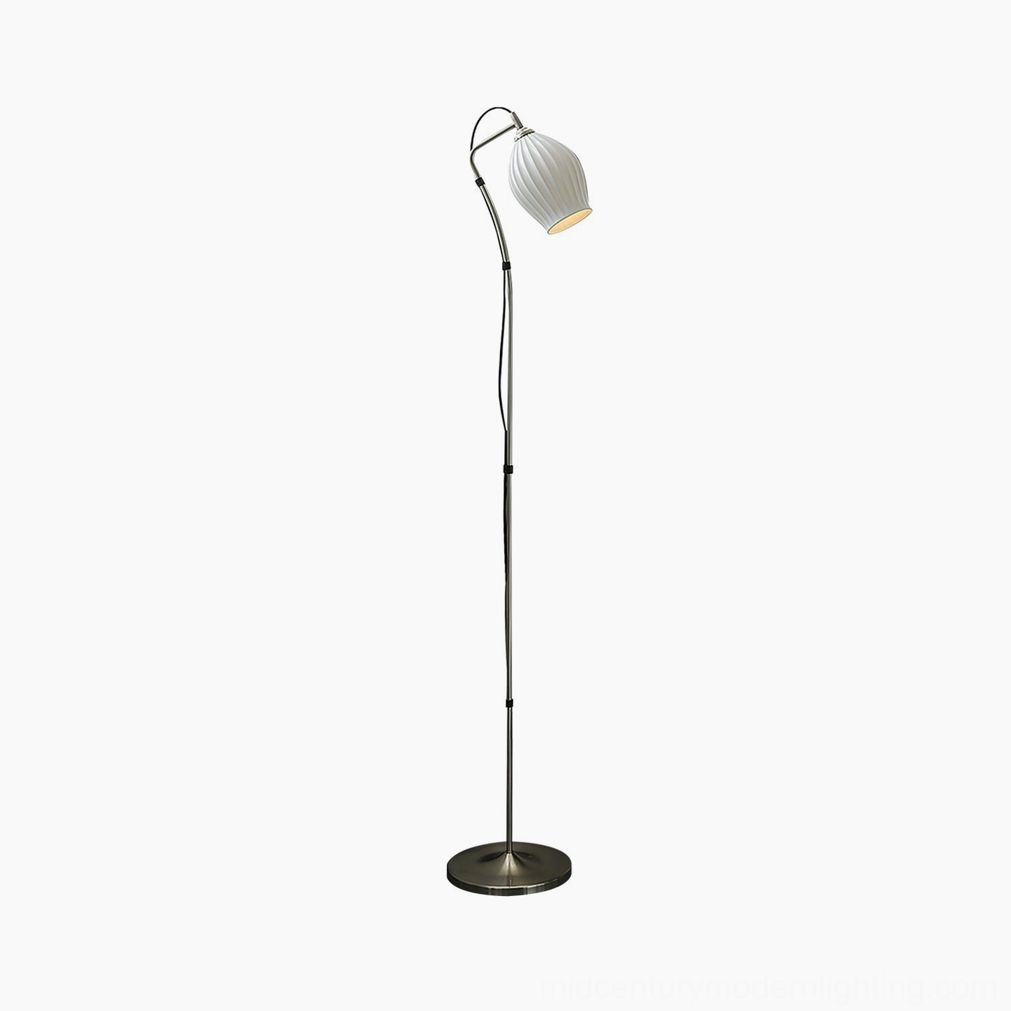 Ceramic ribbed floor lamp as decorative sculptural accent piece in modern gallery-like home setting