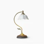 Modern ceramic table lamp with white shade and walnut wood base featuring brass accents, front view on white background