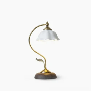 Modern ceramic table lamp with white shade and walnut wood base featuring brass accents, front view on white background