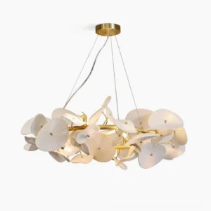 Ceramic wreath chandelier with white pleated petals and gold brass frame, overhead view showcasing circular composition and textured ceramic details