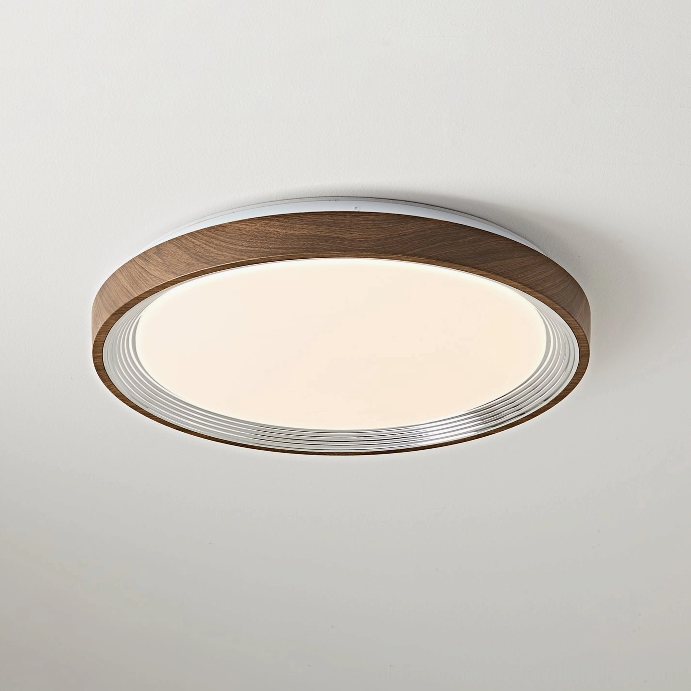Multiple finishes of Cerova LED ceiling light including walnut white gold and cream options