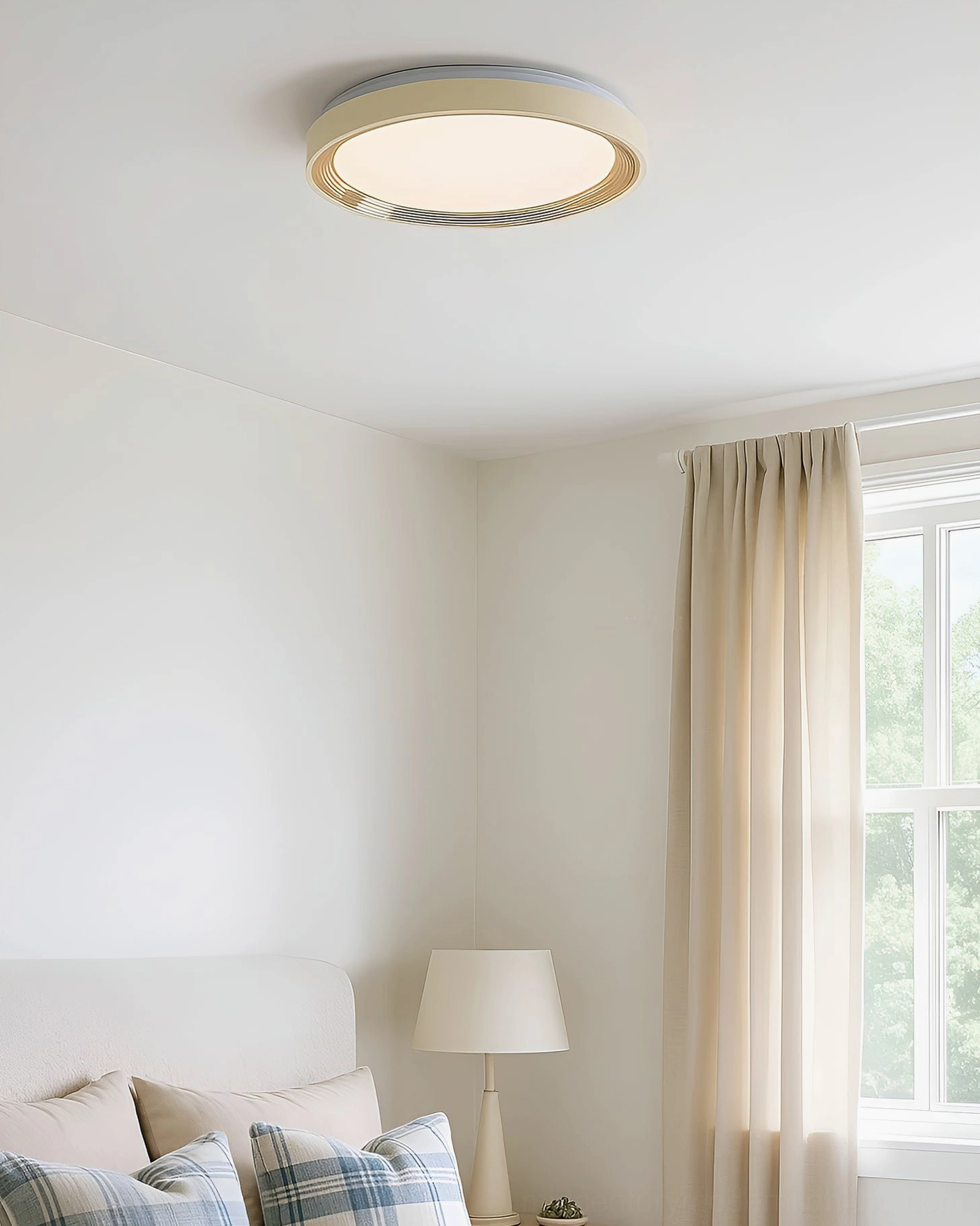 Cerova ceiling fixture with cream frame and gold metallic trim in modern bedroom lighting setup