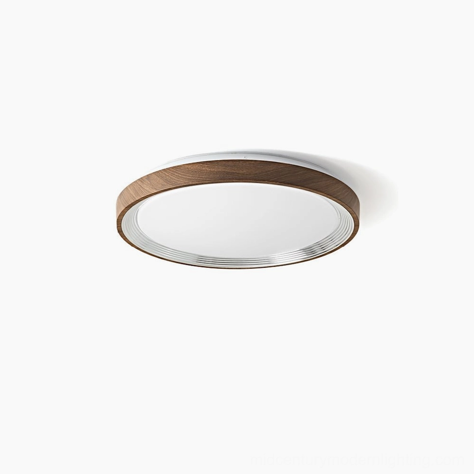 Cerova round LED ceiling light with walnut wood-grain frame and silver metallic trim, overhead studio view
