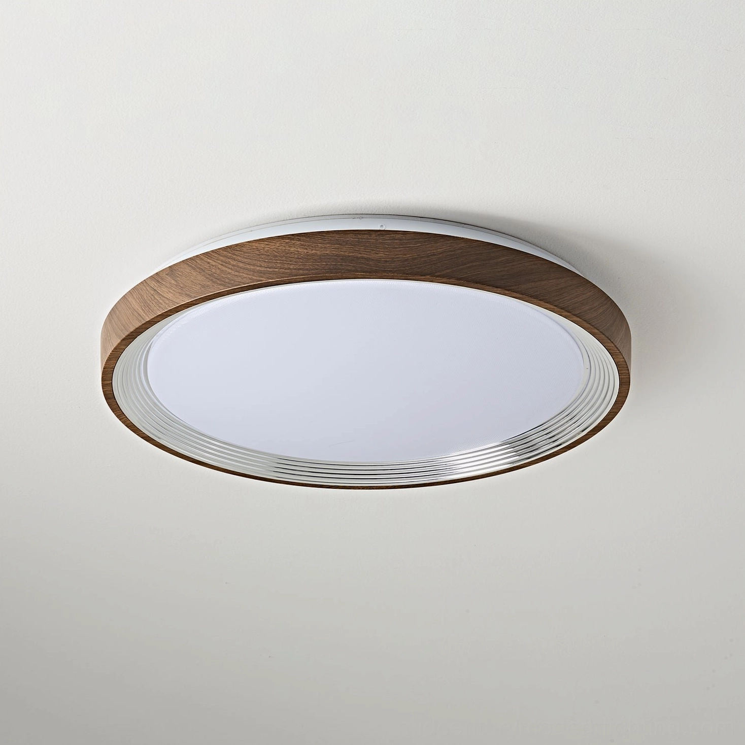 Cerova white finish ceiling light with minimalist design in scandinavian room setting