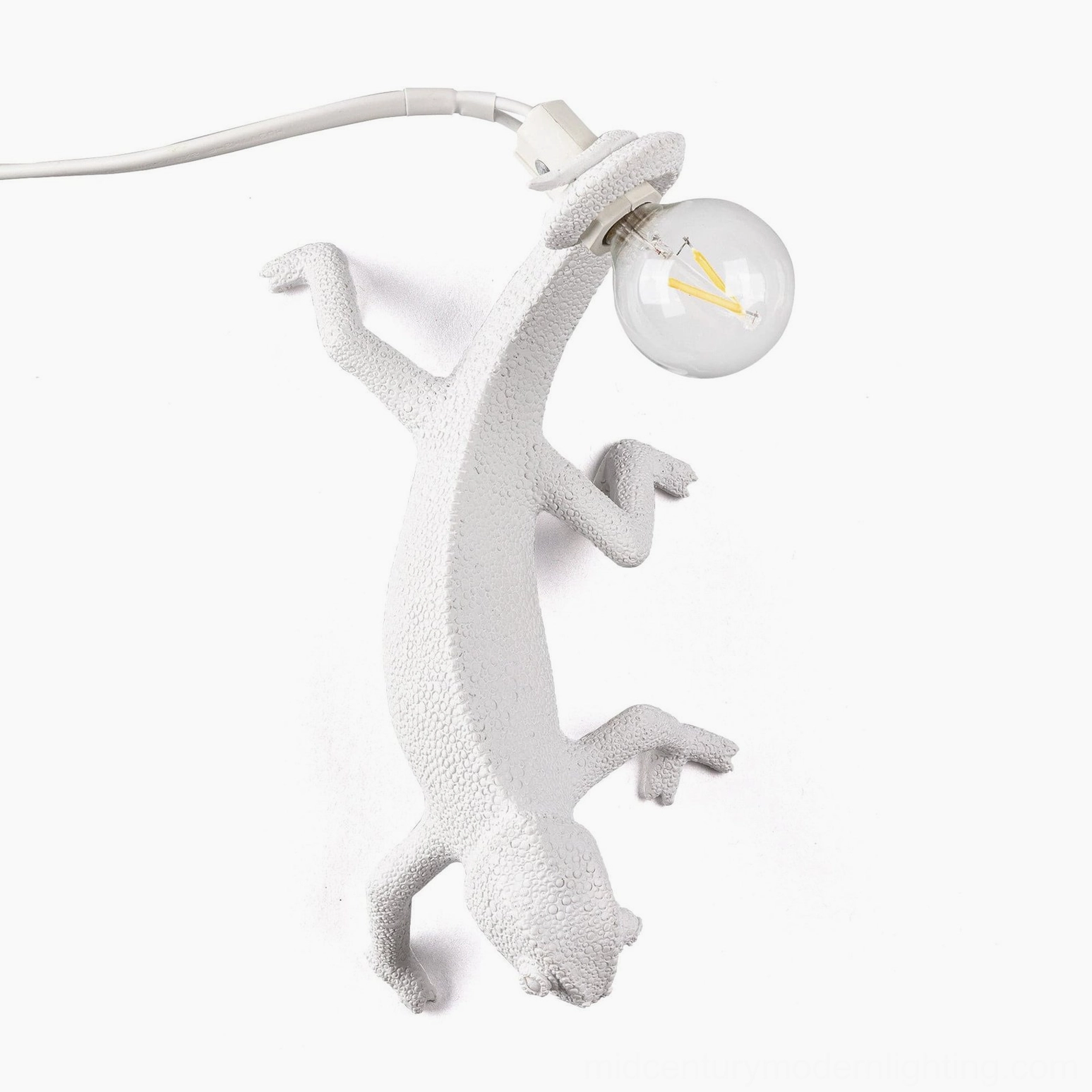 Chameleon wall lamp contemporary home setting, whimsical modern sculptural lighting