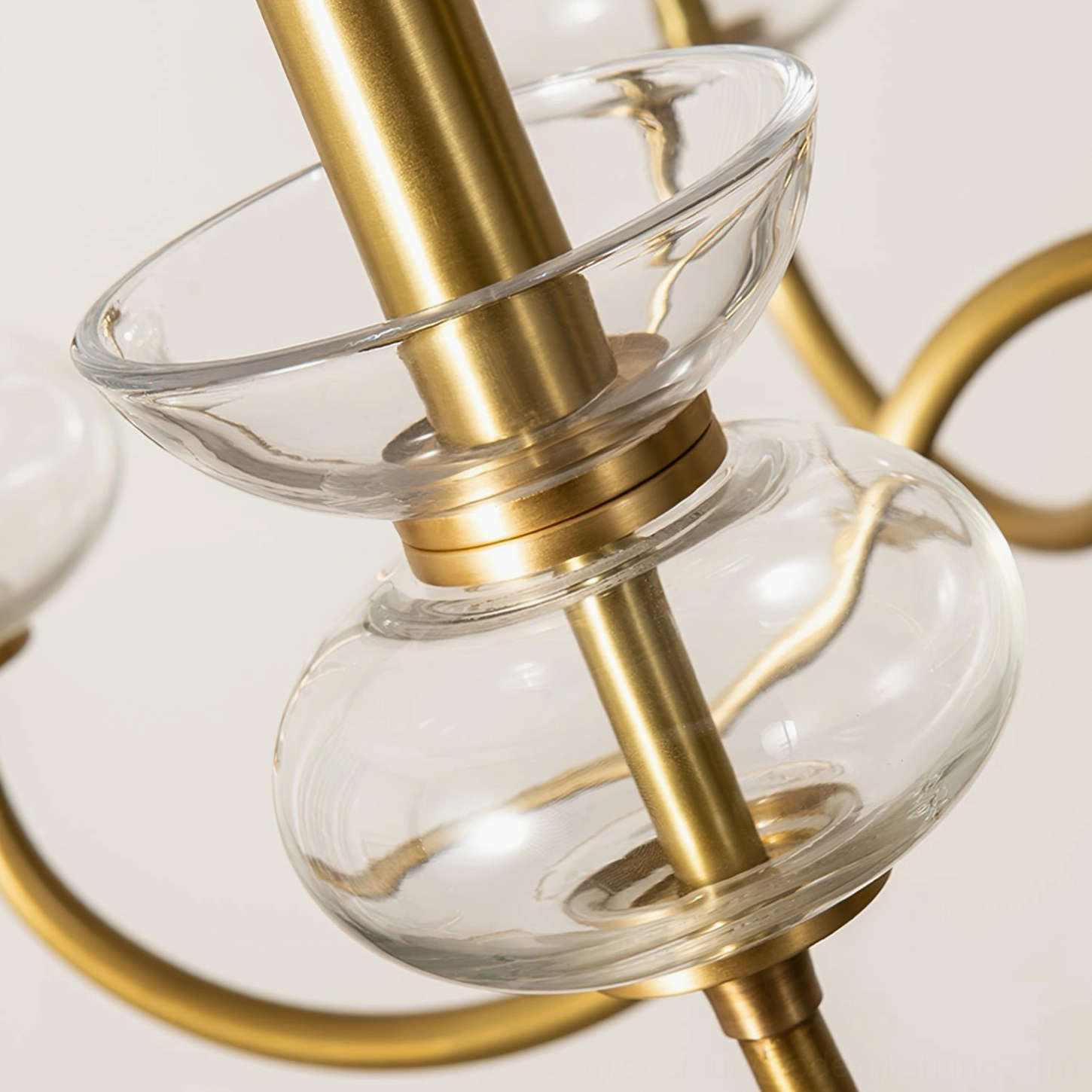 Chandelier glass shade brass arm connection detail close-up craftsmanship macro