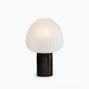 Chanya black marble table lamp with frosted glass ribbed shade on white background, minimalist mushroom design