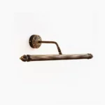 Chatsworth Acanthus brass wall sconce with carved floral backplate and ribbed cylindrical shade, studio side-front view